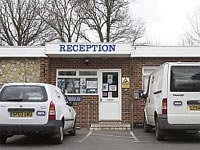 RSPCA vans parked outside the Millbrook reception building